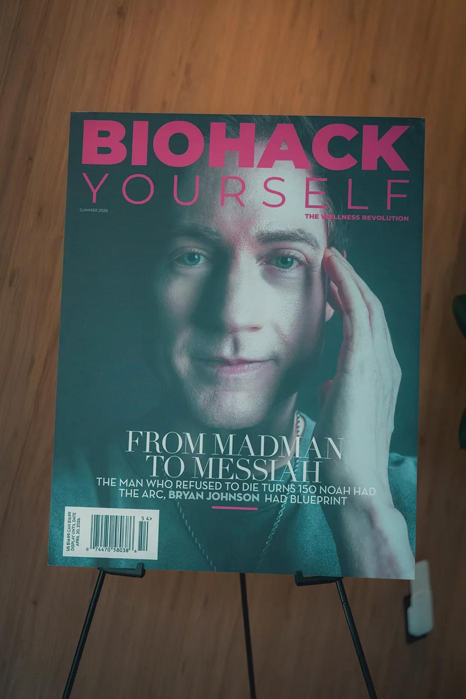 A Biohack Yourself cover displayed on an easel at an event